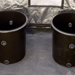 Two bucket with grommets for installing homemade hydroponic marijuana system