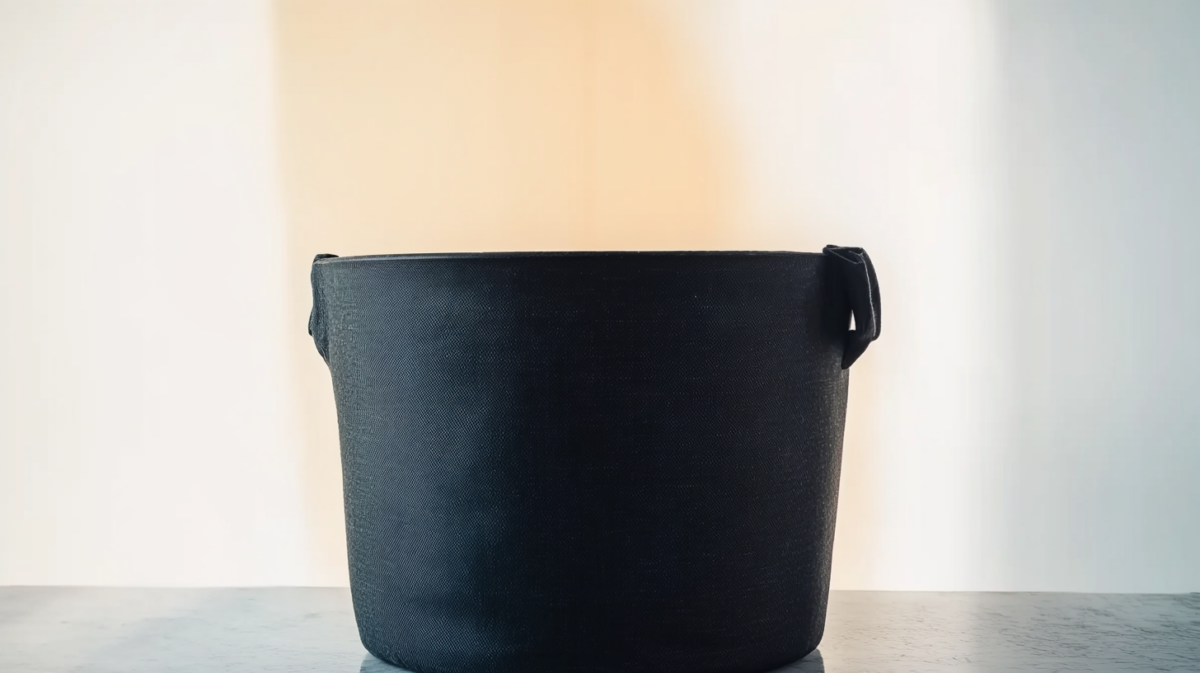 A fabric pot made of breathable material, allowing air to reach the roots of cannabis plants. The fabric helps prevent over-watering and encourages healthier, more efficient root growth.